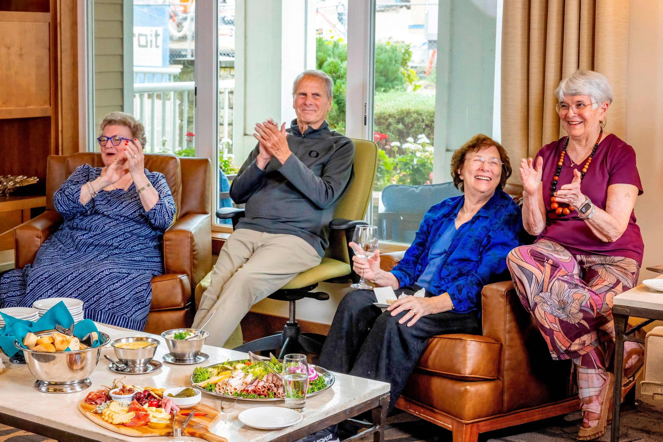 A group of residents socializing at Cascade Manor